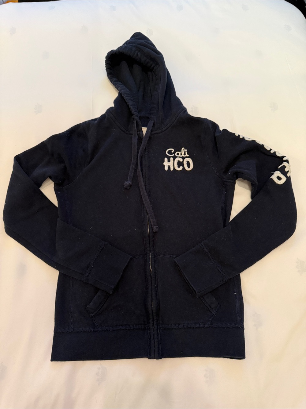 Hollister Navy Zip-Up Hoodie with 'Cali HCO' Chest Logo
